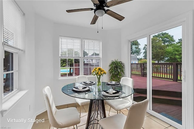 3005 Beech Grove Ln, Suffolk, VA 23435 - dining area with tile patterned floors, ceiling fan, and baseboards