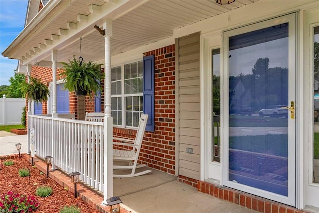 3005 Beech Grove Ln, Suffolk, VA 23435 - view of exterior entry with covered porch and brick siding
