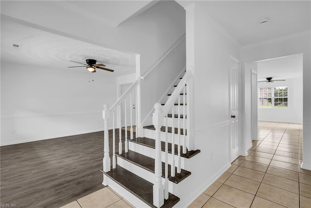 3005 Beech Grove Ln, Suffolk, VA 23435 - staircase featuring ceiling fan and tile patterned flooring