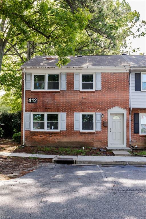 412 Savage Dr Unit A, Newport News, VA 23602 - view of front of property with brick siding and uncovered parking