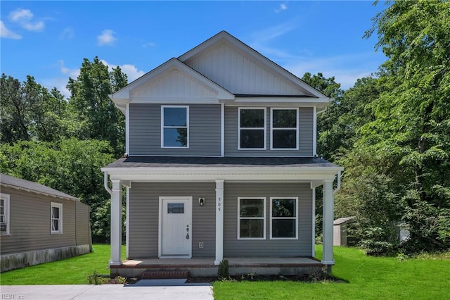 505 Osceola Ave, Suffolk, VA 23434 - view of front of home with a porch, a front lawn, and board and batten siding