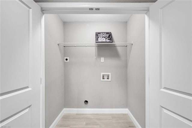 505 Osceola Ave, Suffolk, VA 23434 - laundry area with light wood finished floors, washer hookup, hookup for an electric dryer, and baseboards
