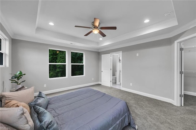 505 Osceola Ave, Suffolk, VA 23434 - carpeted bedroom with a raised ceiling, a walk in closet, crown molding, recessed lighting, and baseboards