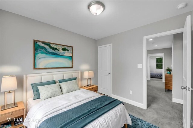 505 Osceola Ave, Suffolk, VA 23434 - bedroom featuring baseboards and carpet flooring