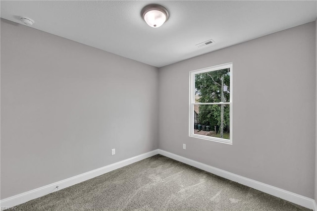 505 Osceola Ave, Suffolk, VA 23434 - carpeted spare room with baseboards and a smoke detector