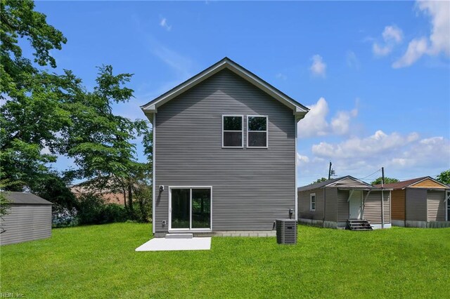 505 Osceola Ave, Suffolk, VA 23434 - back of property with entry steps, a yard, and central air condition unit