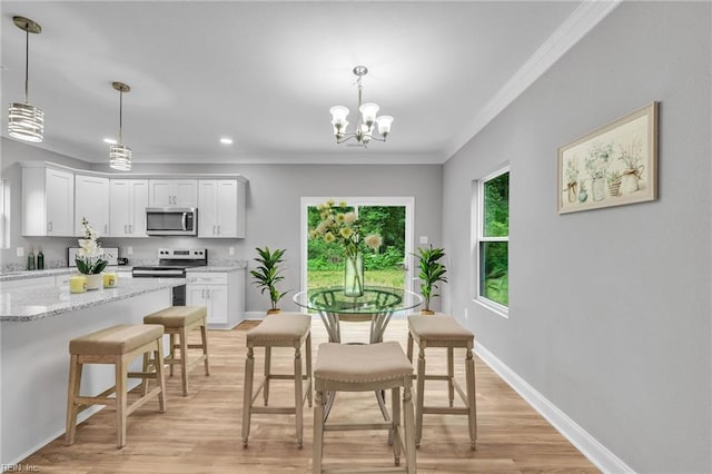 505 Osceola Ave, Suffolk, VA 23434 - dining area featuring crown molding, light wood-style floors, a chandelier, baseboards, and recessed lighting