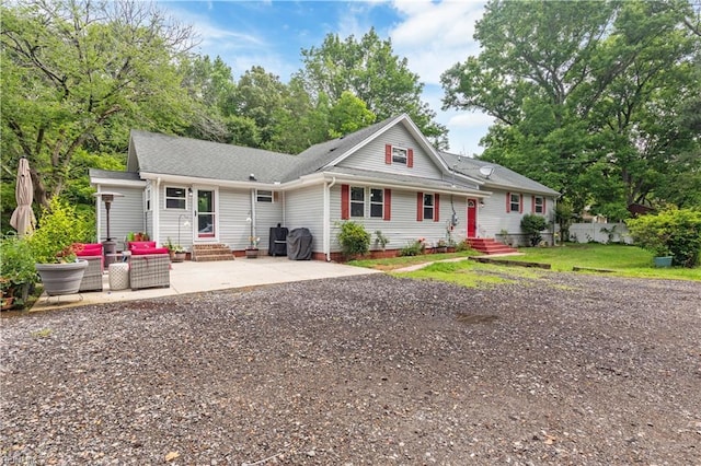 891 Bells Mill Rd, Chesapeake, VA 23322 - view of front facade featuring entry steps, a patio, a shingled roof, and an outdoor living space