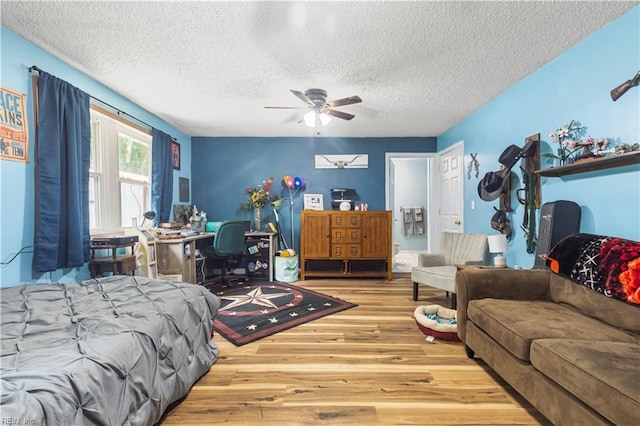 891 Bells Mill Rd, Chesapeake, VA 23322 - bedroom featuring wood finished floors, a textured ceiling, and a ceiling fan