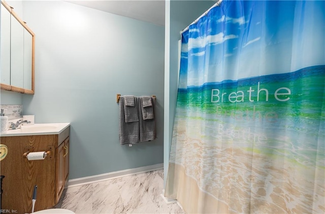 891 Bells Mill Rd, Chesapeake, VA 23322 - bathroom featuring vanity, marble look tiles, a shower with shower curtain, and baseboards