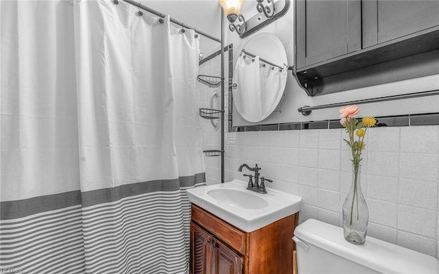 746 Burksdale Rd, Norfolk, VA 23518 - bathroom with tile walls, vanity, toilet, and a shower with shower curtain