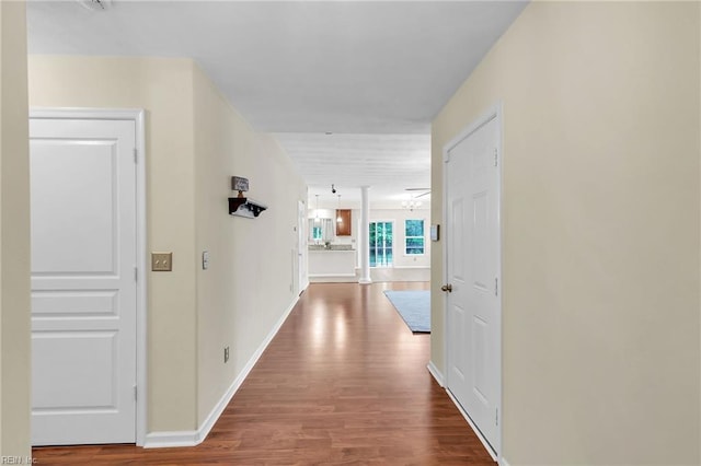 5018 Kings Grant Cir, Suffolk, VA 23434 - corridor with wood finished floors and baseboards