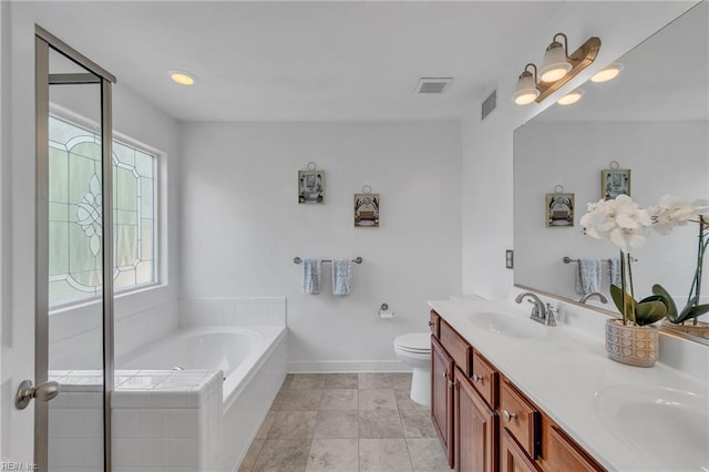 5018 Kings Grant Cir, Suffolk, VA 23434 - full bath with double vanity, a bath, toilet, and baseboards