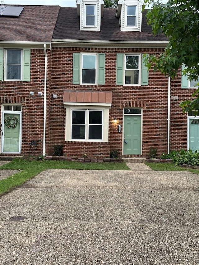 1183 Killington Arch, Chesapeake, VA 23320 - view of front facade with brick siding and roof with shingles