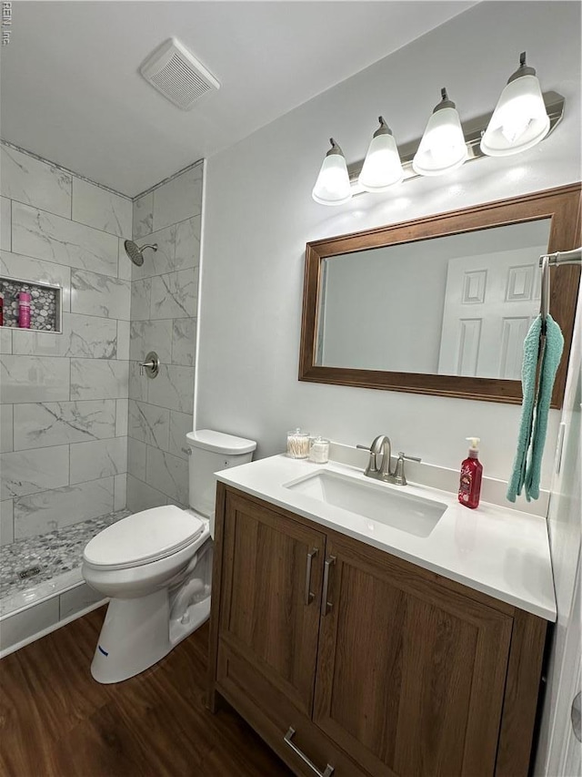 1183 Killington Arch, Chesapeake, VA 23320 - full bath with vanity, toilet, tiled shower, and wood finished floors