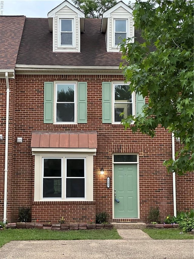 1183 Killington Arch, Chesapeake, VA 23320 - view of front facade featuring brick siding and roof with shingles