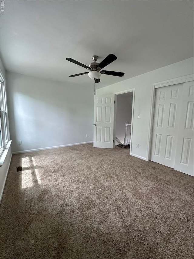 1183 Killington Arch, Chesapeake, VA 23320 - unfurnished bedroom with carpet, baseboards, ceiling fan, and a closet