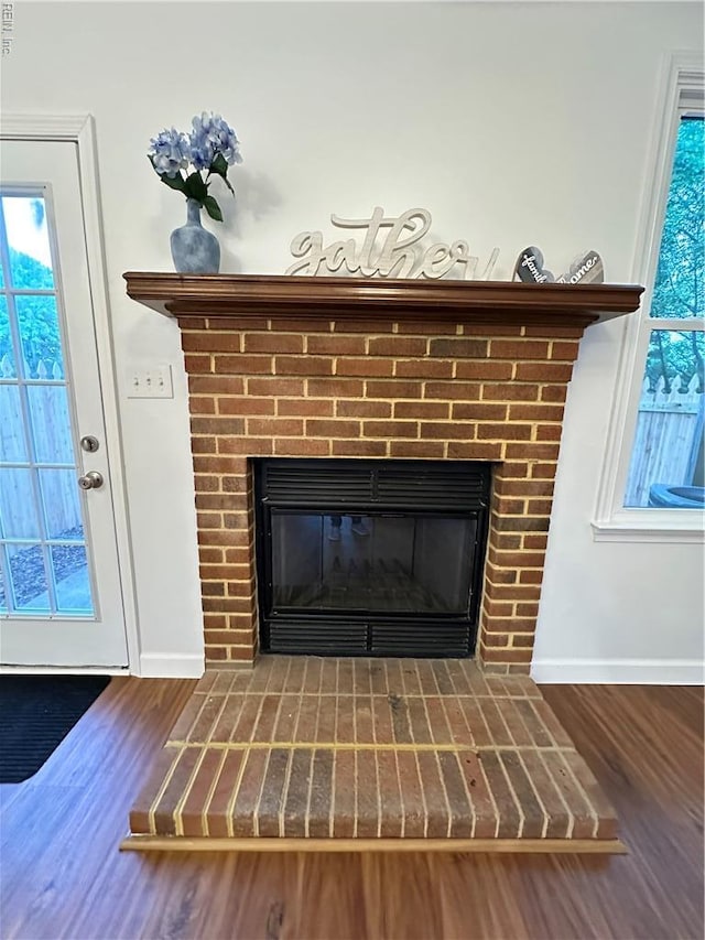 1183 Killington Arch, Chesapeake, VA 23320 - detailed view of a fireplace, baseboards, and wood finished floors