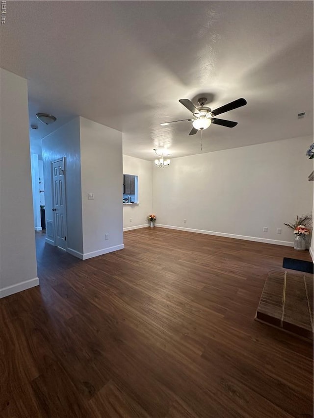 1183 Killington Arch, Chesapeake, VA 23320 - unfurnished living room featuring ceiling fan, dark wood-style floors, and baseboards