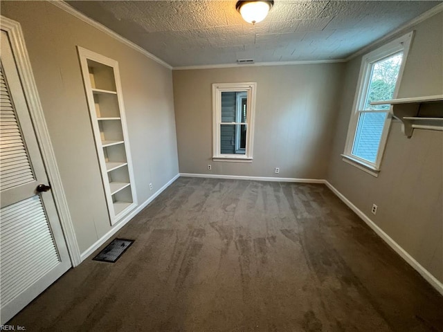 714 B St, Chesapeake, VA 23324 - empty room with dark colored carpet, built in features, baseboards, and ornamental molding