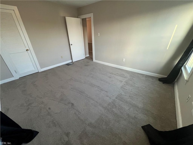 714 B St, Chesapeake, VA 23324 - unfurnished bedroom featuring carpet flooring and baseboards