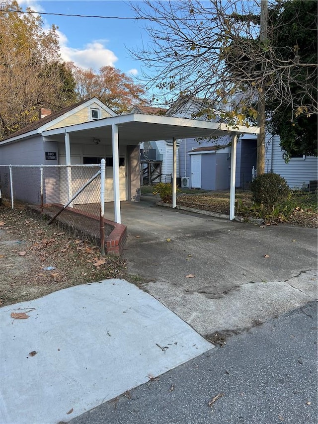 714 B St, Chesapeake, VA 23324 - view of vehicle parking with driveway and a carport