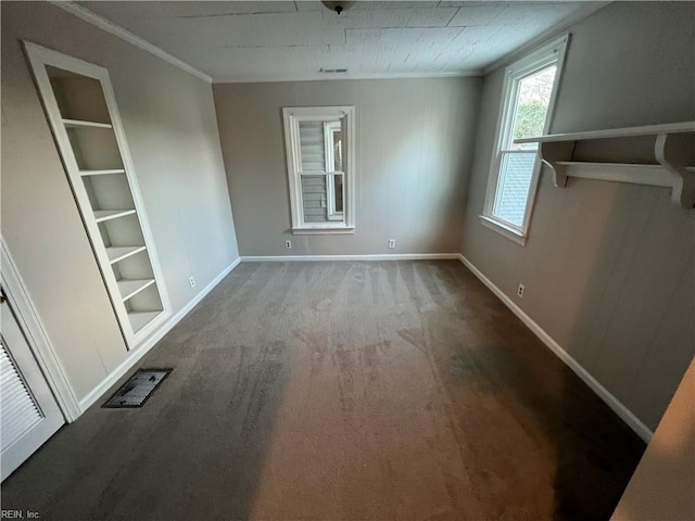 714 B St, Chesapeake, VA 23324 - carpeted empty room with built in shelves, baseboards, and crown molding