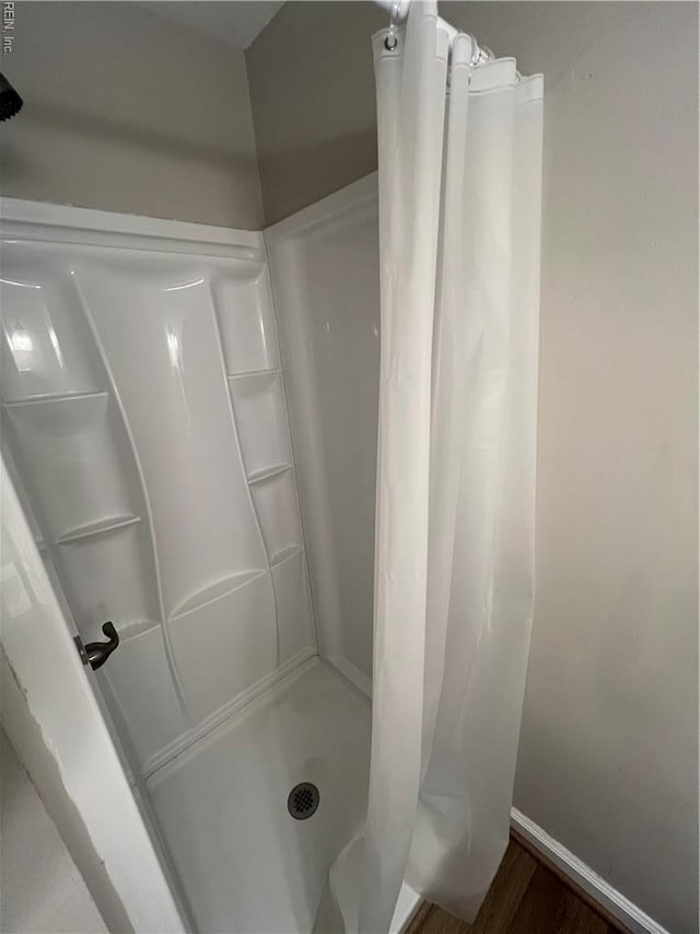 714 B St, Chesapeake, VA 23324 - full bathroom featuring a shower stall, wood finished floors, and baseboards
