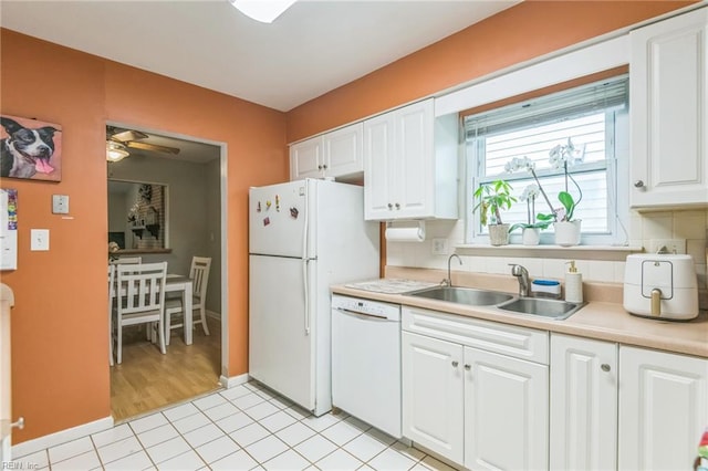 1700 Dylan Dr, Virginia Beach, VA 23464 - kitchen with white appliances, a sink, a ceiling fan, white cabinetry, and light countertops