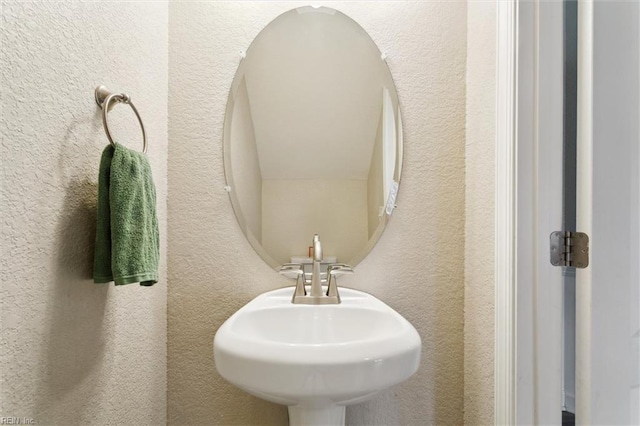 105 Brogden Ct, Hampton, VA 23666 - bathroom with a textured wall and a sink