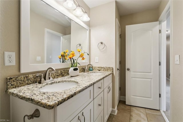 105 Brogden Ct, Hampton, VA 23666 - full bathroom with double vanity, baseboards, and tile patterned flooring
