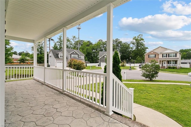 105 Brogden Ct, Hampton, VA 23666 - covered porch featuring a lawn and a residential view