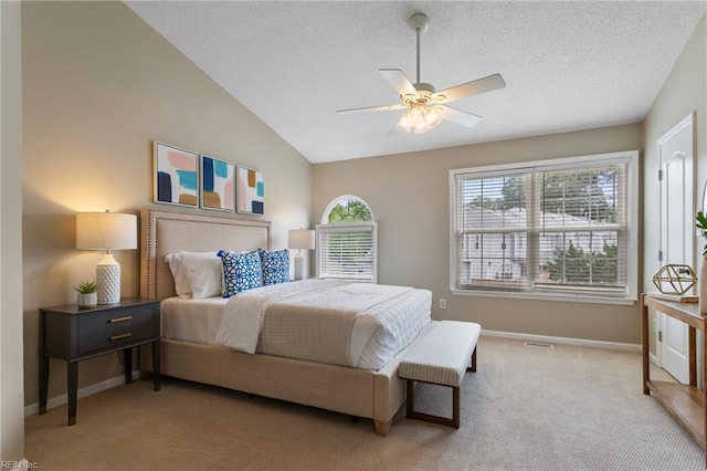 711 Windbrook Cir, Newport News, VA 23606 - carpeted bedroom featuring baseboards, vaulted ceiling, a textured ceiling, and a ceiling fan