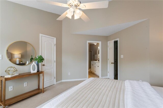 711 Windbrook Cir, Newport News, VA 23606 - bedroom featuring baseboards, light carpet, ensuite bath, and a towering ceiling