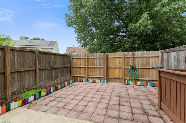 711 Windbrook Cir, Newport News, VA 23606 - fenced backyard featuring a patio area