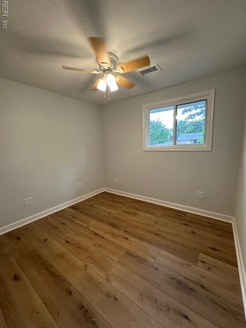 128 Ridgewood Rd, Chesapeake, VA 23325 - unfurnished room featuring ceiling fan, wood-type flooring, and baseboards