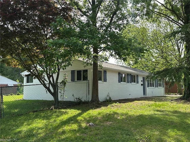 128 Ridgewood Rd, Chesapeake, VA 23325 - view of home's exterior featuring brick siding