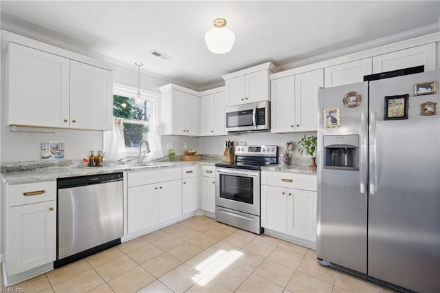 740 Hilda Pine Dr, Chesapeake, VA 23322 - kitchen featuring stainless steel appliances, a sink, white cabinets, light tile patterned floors, and pendant lighting