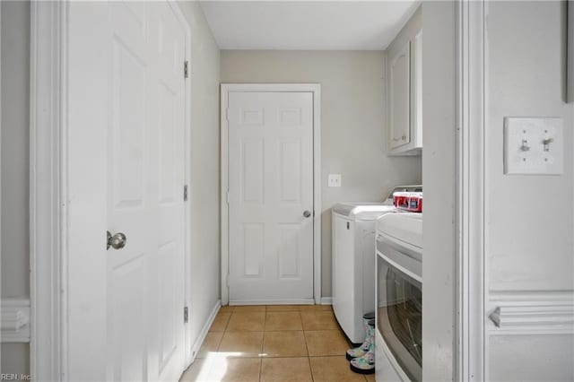 740 Hilda Pine Dr, Chesapeake, VA 23322 - washroom with washing machine and clothes dryer, light tile patterned flooring, and cabinet space