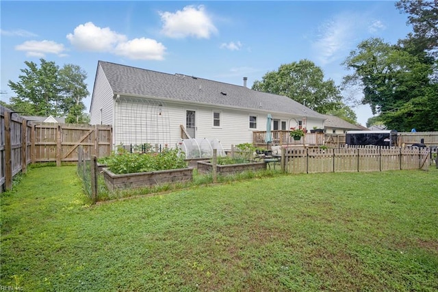 740 Hilda Pine Dr, Chesapeake, VA 23322 - rear view of property with a garden, roof with shingles, and a wooden deck