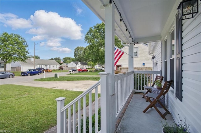 740 Hilda Pine Dr, Chesapeake, VA 23322 - covered porch with a residential view and a yard