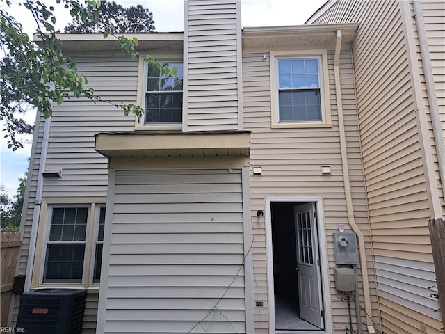 800 Pencil Box Way, Virginia Beach, VA 23462 - rear view of house with central AC unit and a chimney