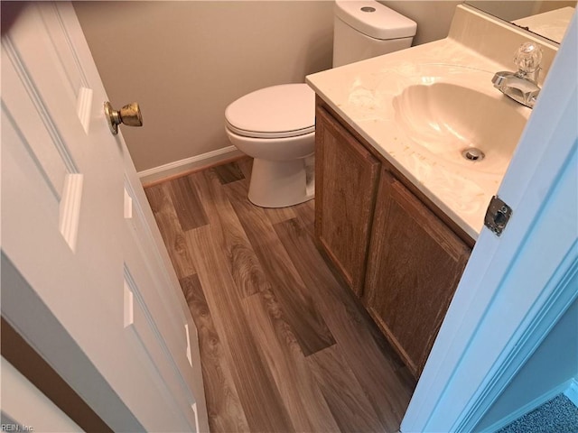 800 Pencil Box Way, Virginia Beach, VA 23462 - bathroom featuring wood finished floors, toilet, vanity, and baseboards