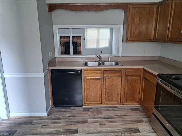 800 Pencil Box Way, Virginia Beach, VA 23462 - kitchen with black dishwasher, a sink, stainless steel electric range, light wood-type flooring, and brown cabinets