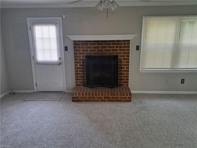 800 Pencil Box Way, Virginia Beach, VA 23462 - unfurnished living room with carpet floors, a ceiling fan, a brick fireplace, ornamental molding, and baseboards