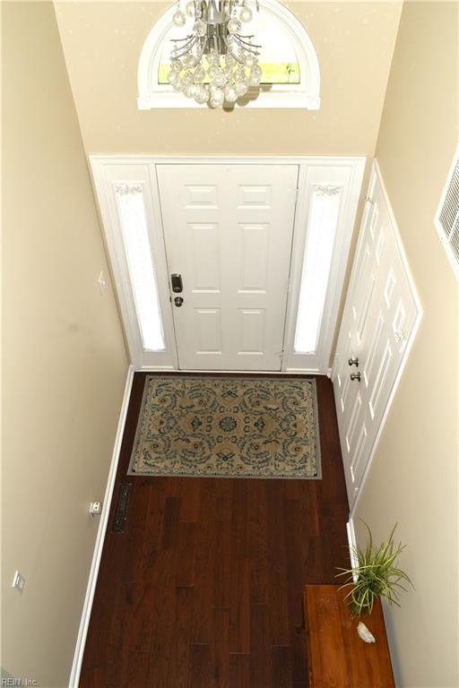 1176 Pond Cypress Dr, Virginia Beach, VA 23455 - entrance foyer with a chandelier and wood finished floors