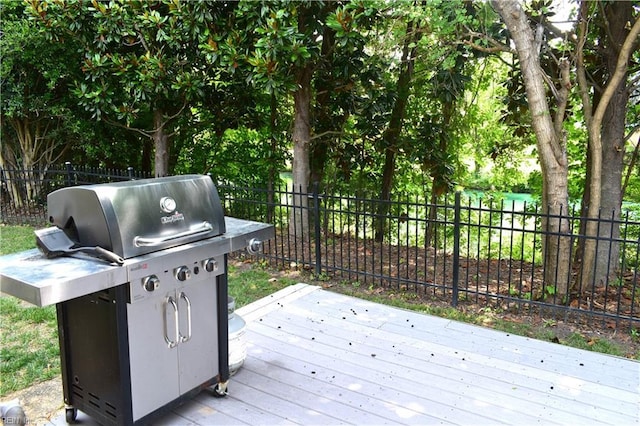 1176 Pond Cypress Dr, Virginia Beach, VA 23455 - wooden deck with a fenced backyard and area for grilling