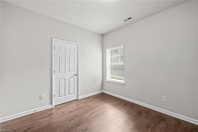 408 Coastal Walk Pl Unit 102, Virginia Beach, VA 23451 - empty room with wood finished floors and baseboards