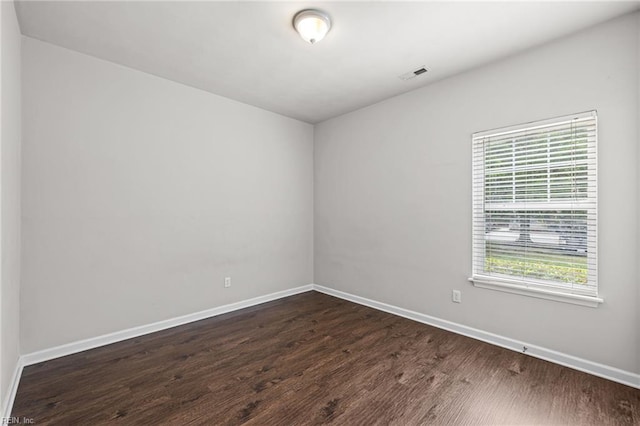 408 Coastal Walk Pl Unit 102, Virginia Beach, VA 23451 - unfurnished room featuring dark wood-style flooring and baseboards
