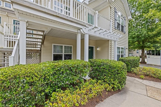 408 Coastal Walk Pl Unit 102, Virginia Beach, VA 23451 - property entrance with a balcony